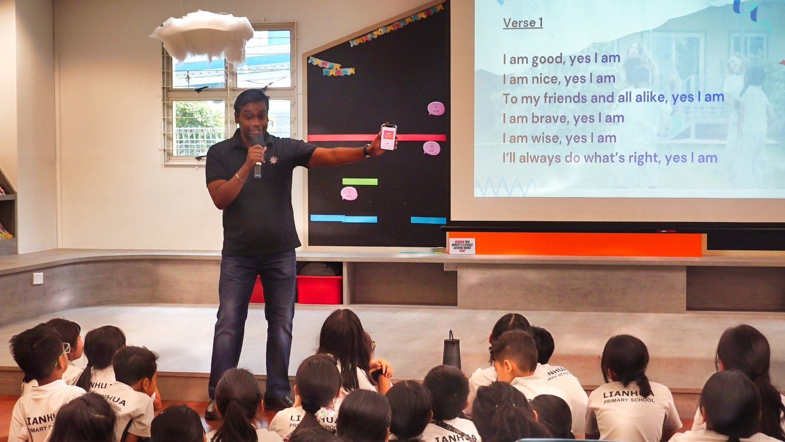 Students listening during the school visit